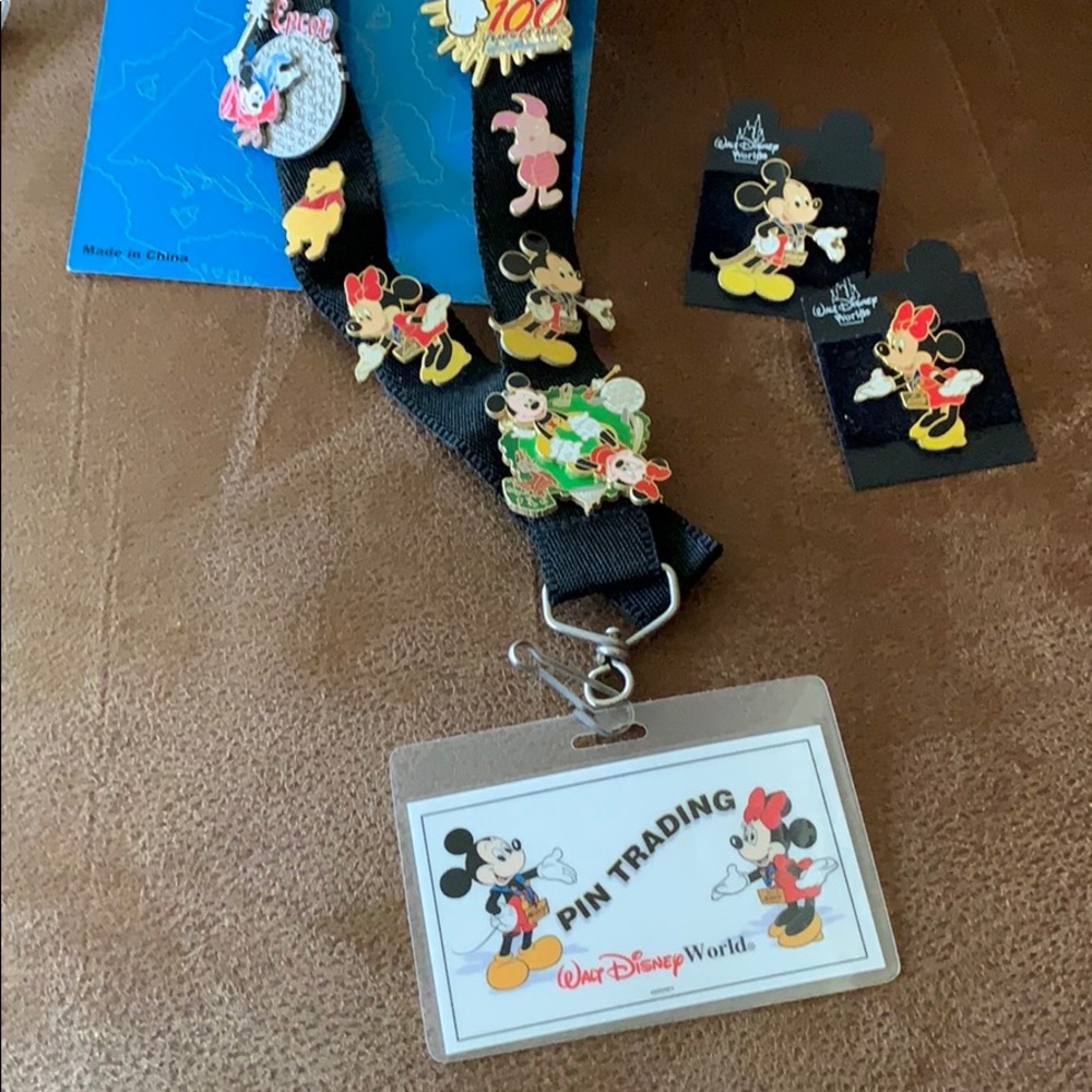 SOLD.  Walt Disney Pins on lanyard (17 Pins)